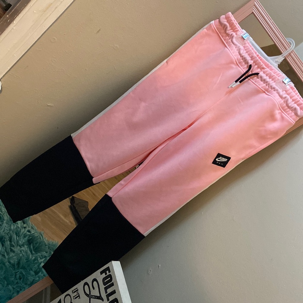 Jordan sweat pants, size large for kids. Pink, Black and White
